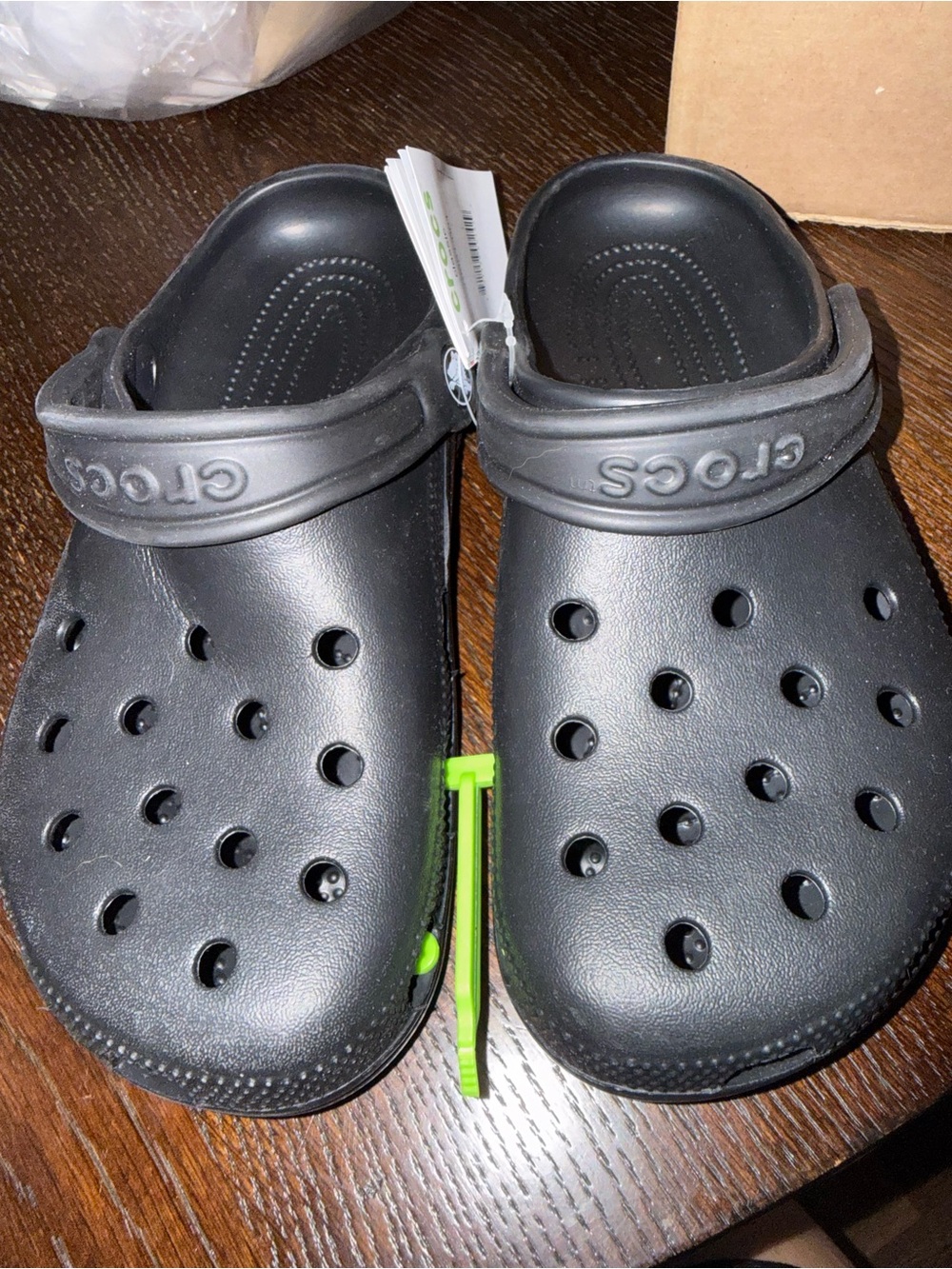 CROCS Kids Classic Clog in Black with Green Tag